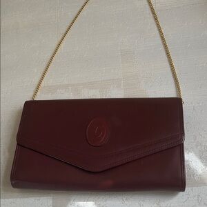 Cartier Burgundy Clutch with Gold Chain